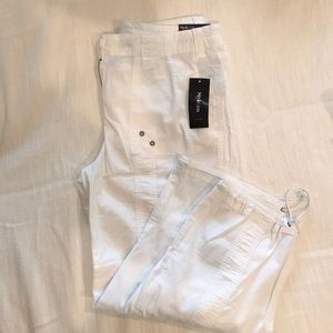 NWT and extra white button. White capri pants.